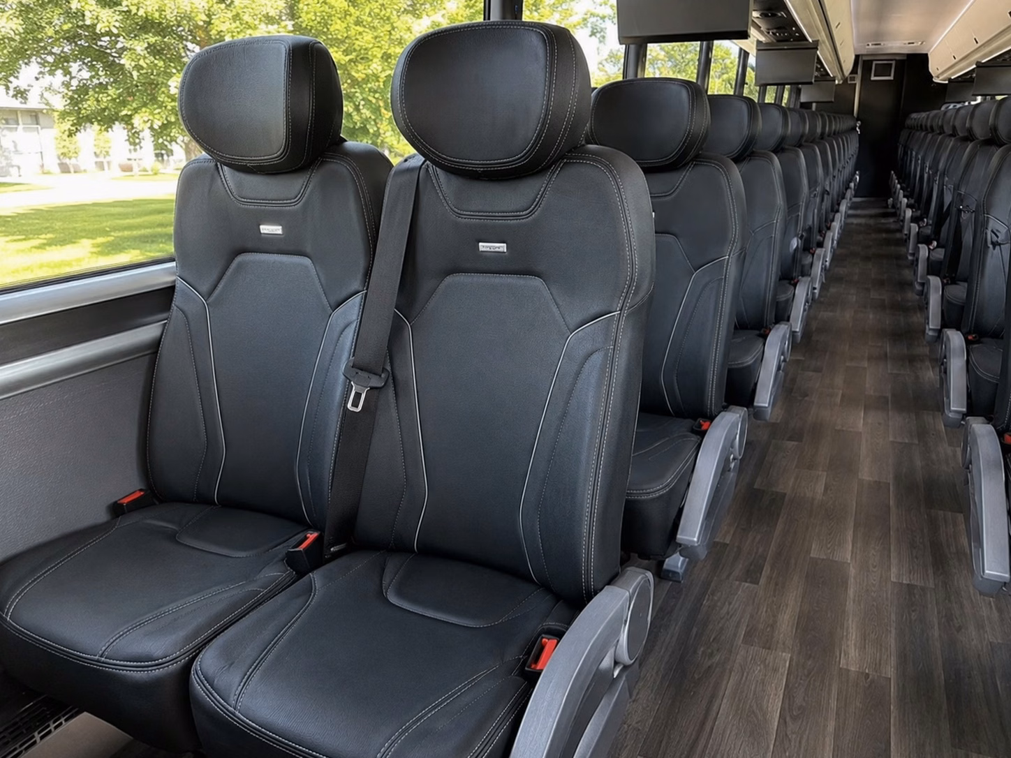 how trip distance and duration affect charter bus rental rates in aurora